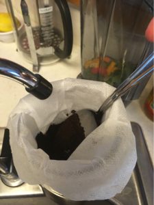 adding water to cold brew coffee