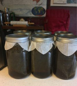 three jars of cold brew coffee in mason jars